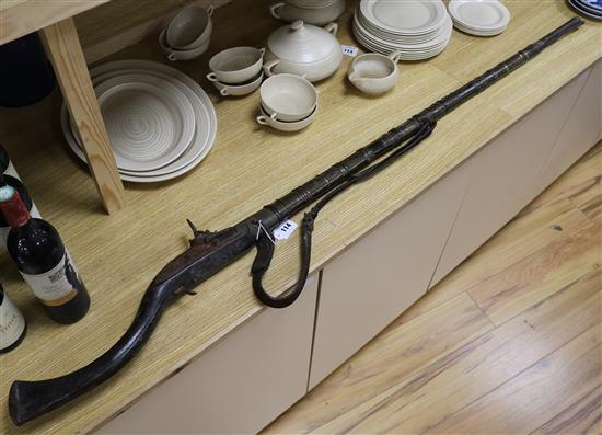 A Middle Eastern flintlock musket length 162cm